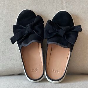 UGG brand size 7.5 black suede slip on shoe with bow. Make an offer!